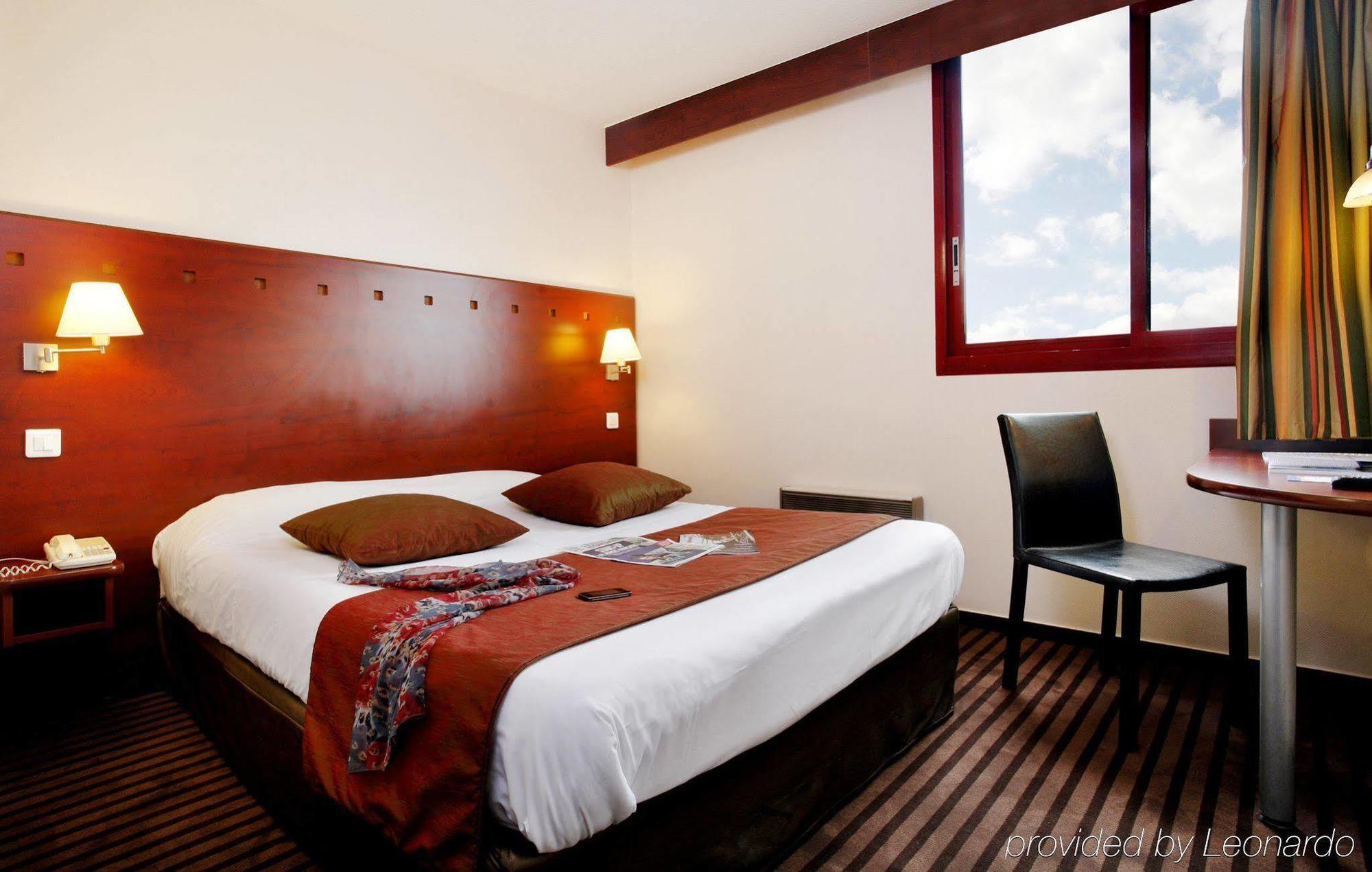 Hotel Gallieni Женвилье Экстерьер фото